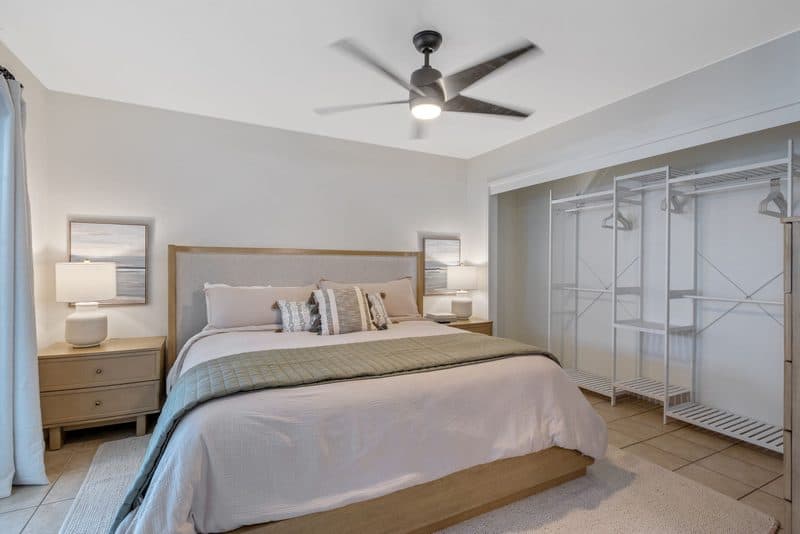 Bedroom with coastal light and built-in closet