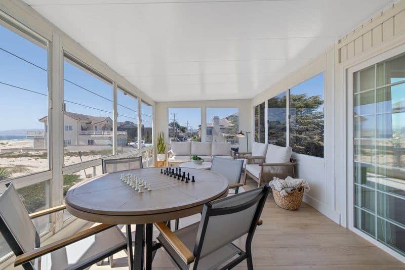 Chess table by the sunroom windows